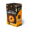 Siam Massaman Curry Paste packaging with wooden design and orange accents on a white background