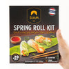 Siam Spring Roll Kit packaging held by a hand on a white background